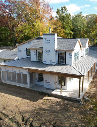 house under construction with new metal roofing bourbon in