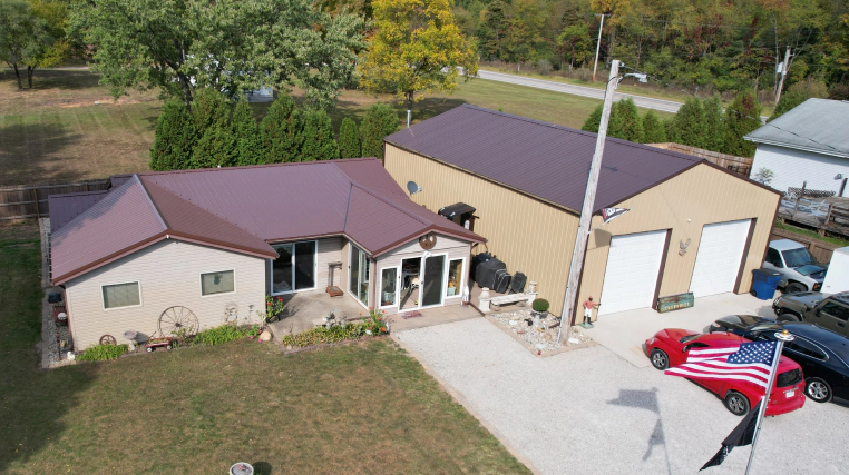 one story house with red metal roofing bourbon in 1